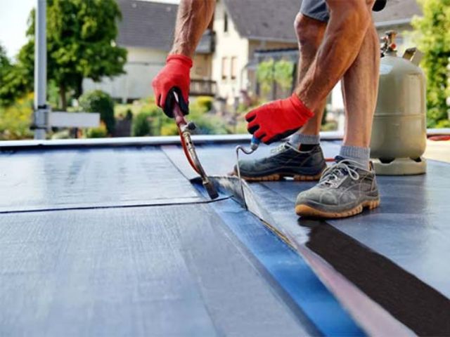 Flat roof being installed.