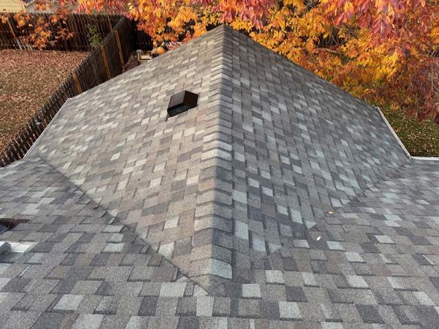 Newly completed grey shingle roof in Loveland, CO.